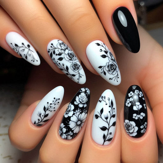Enchanting Floral Elegance Medium Almond Black and White Nail Set with Intricate Botanical Designs