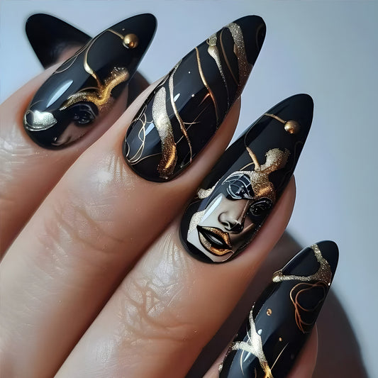 Artistic Black Medium Almond Nails with Gold Abstract Designs and Unique Visual Effects