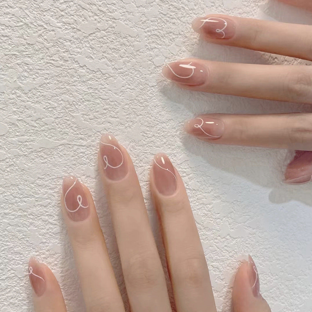Elegant Whimsy Medium Almond Beige with Delicate White Swirls Press-On Nail Set