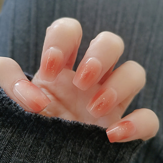 Chic Elegance Medium Square Peach Ombre Press on Nail Set with Sparkling Glitter Finish