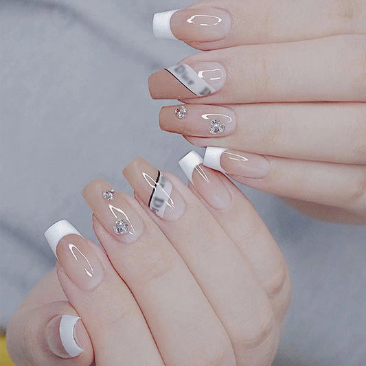 Elegant Bliss Long Square Clear Press-On Nail Set with Marble Accents and Rhinestone Embellishments