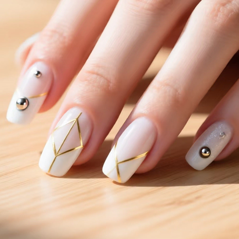 Chic Elegance Long Square White Nails with Gold Geometric Accents and Metallic Dots