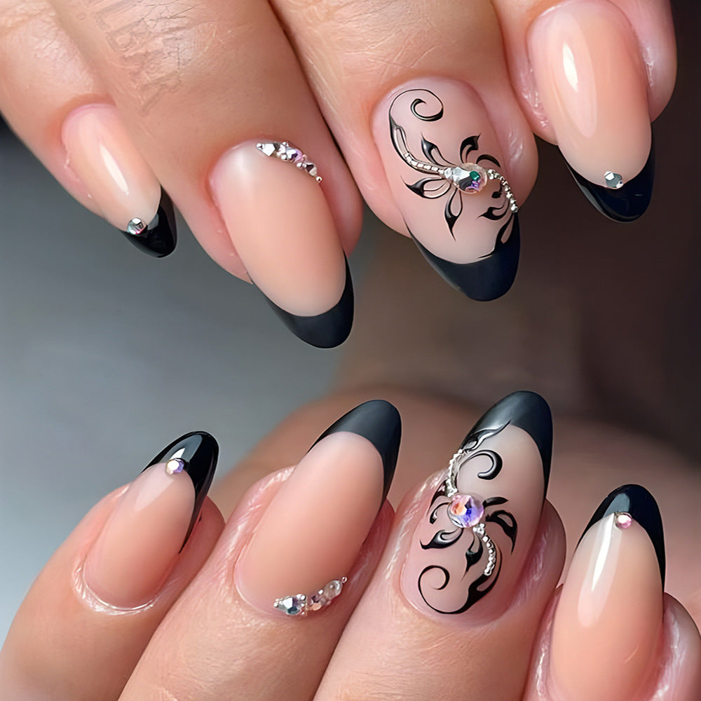 Elegant Midnight Charm Long Almond Black and beige Press On Nail Set with Rhinestone Accents and Ornate Swirls