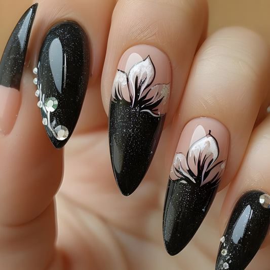 Gothic Elegance Long Stiletto Black Nails with Floral Design and Glitter Accents