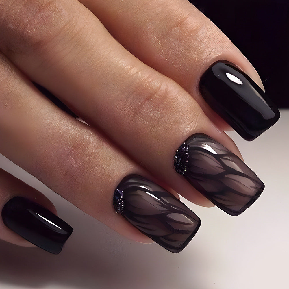 Gothic Elegance Long Square Press On Nail Set in Deep Black with Intricate Sheer Pattern and Glitter Accent