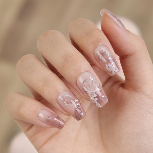 Whimsical Elegance Long Square Blush Pink Press On Nail Set with Floral Accents and Glittering Details