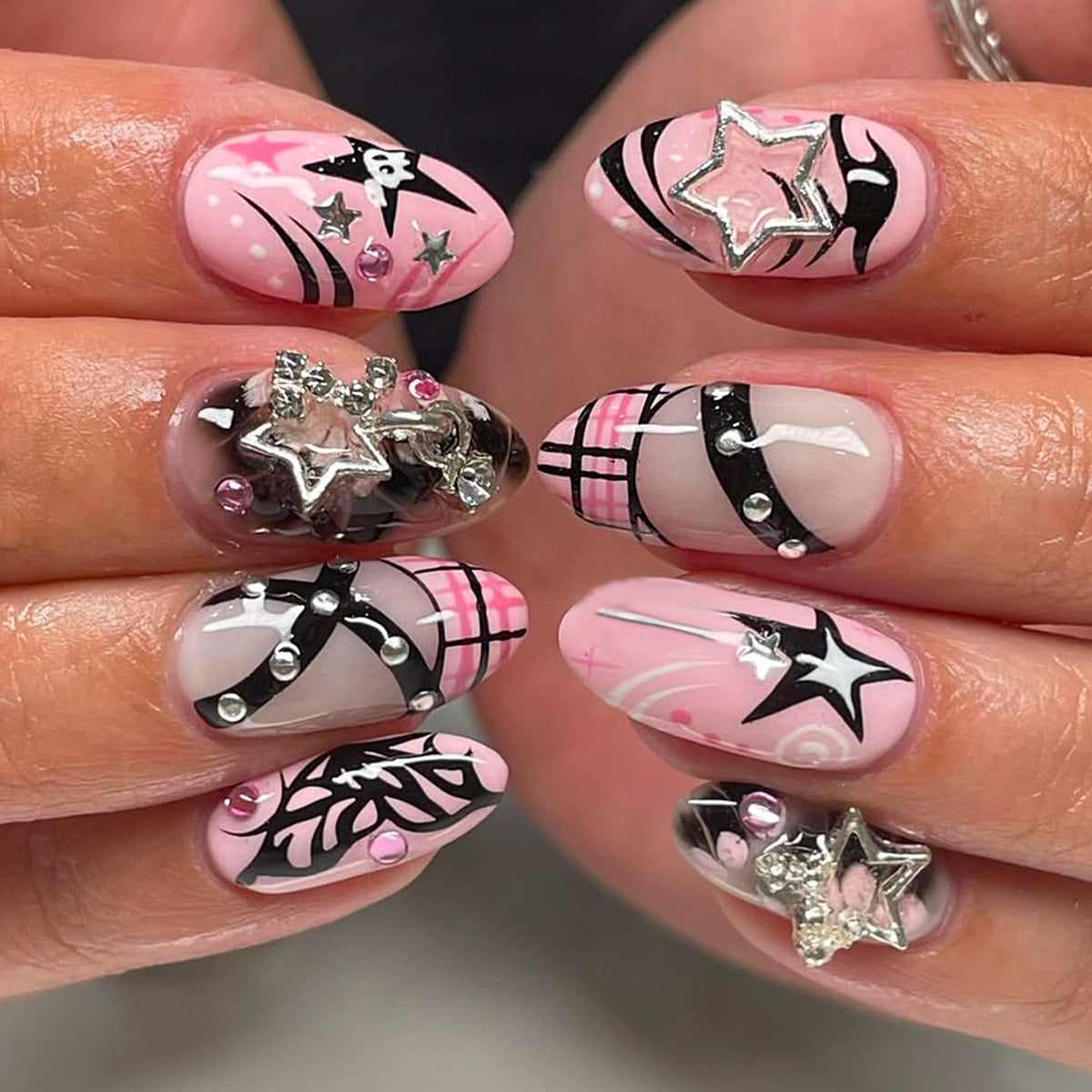 Dreamy Starry Medium Almond Pink Nail Set with Glamorous Rhinestone Accents