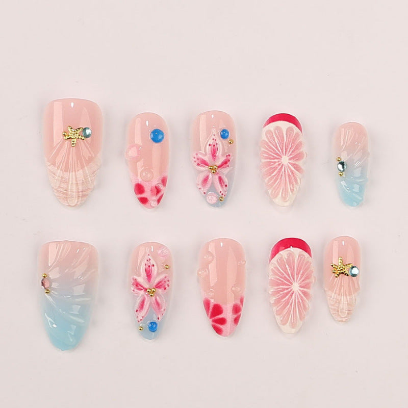 Tropical Blossom Medium Almond Pink Nail Set with Unique Floral and Gem Accents
