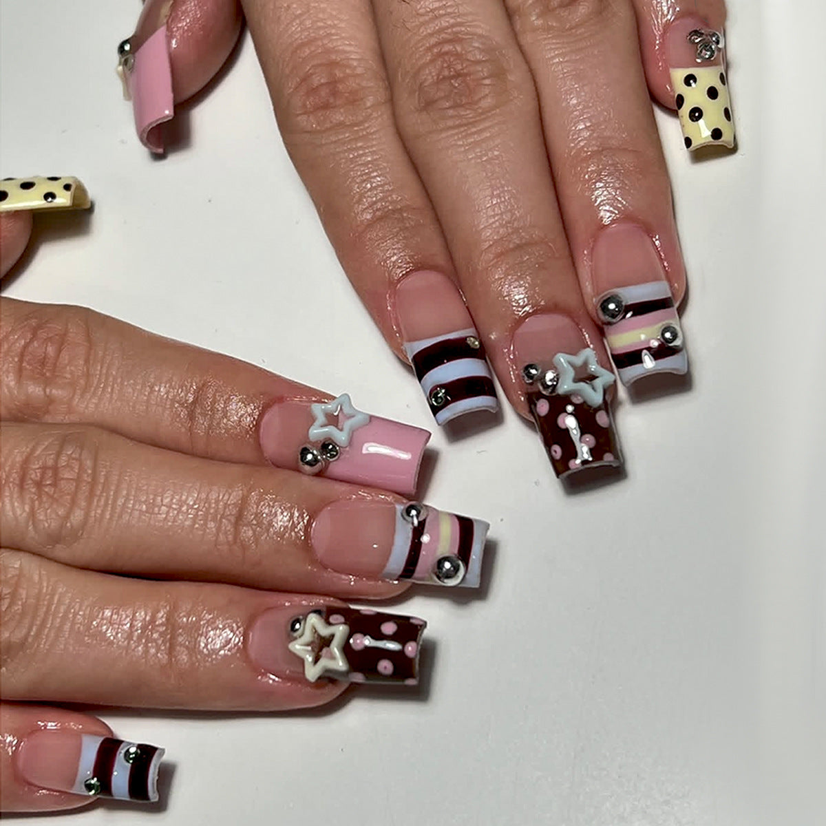 Whimsical Charm Long Square Pink and Brown Nail Set with Star and Dot Accents