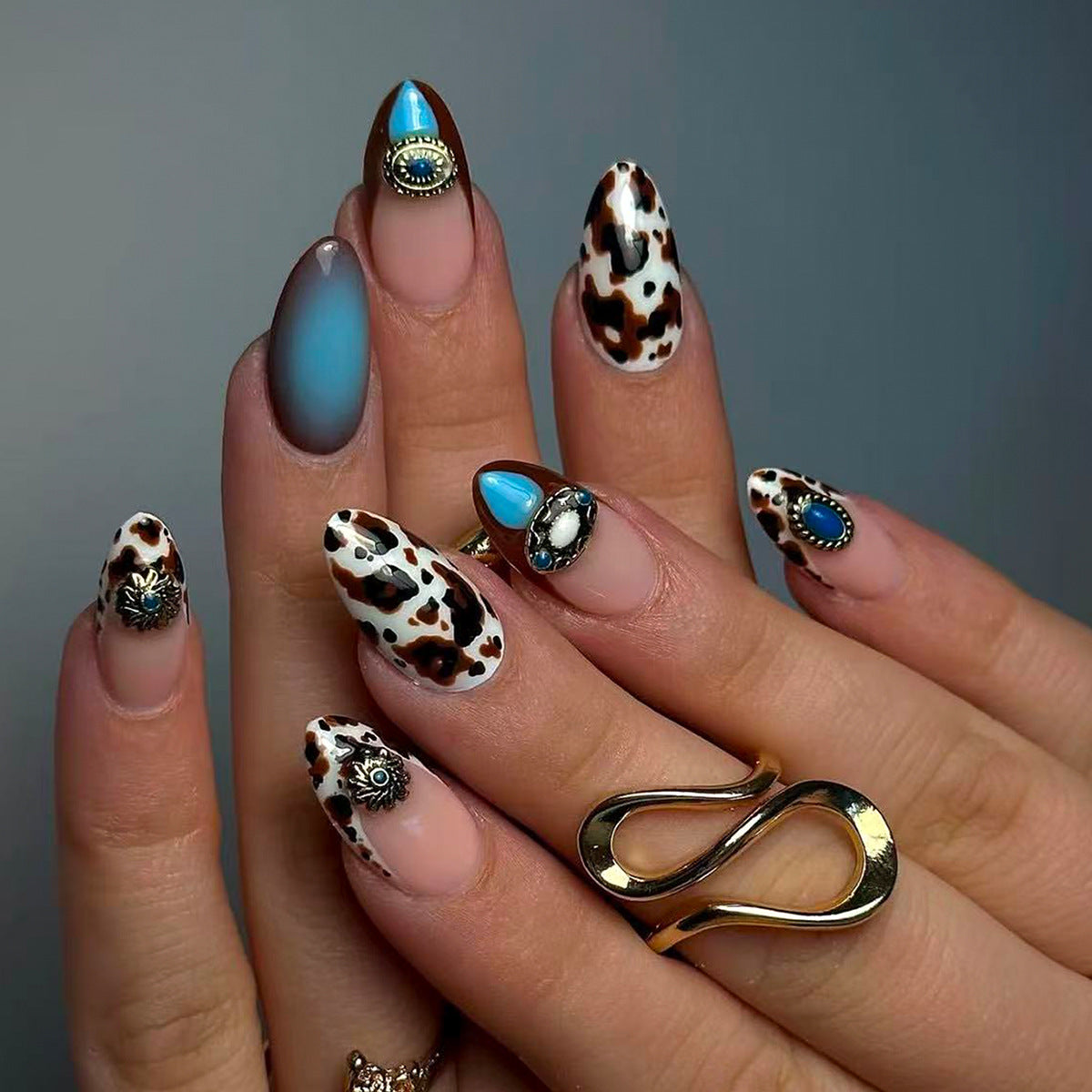 Bohemian Chic Medium Almond Cow Print Nail Set with Unique Gemstone Accents