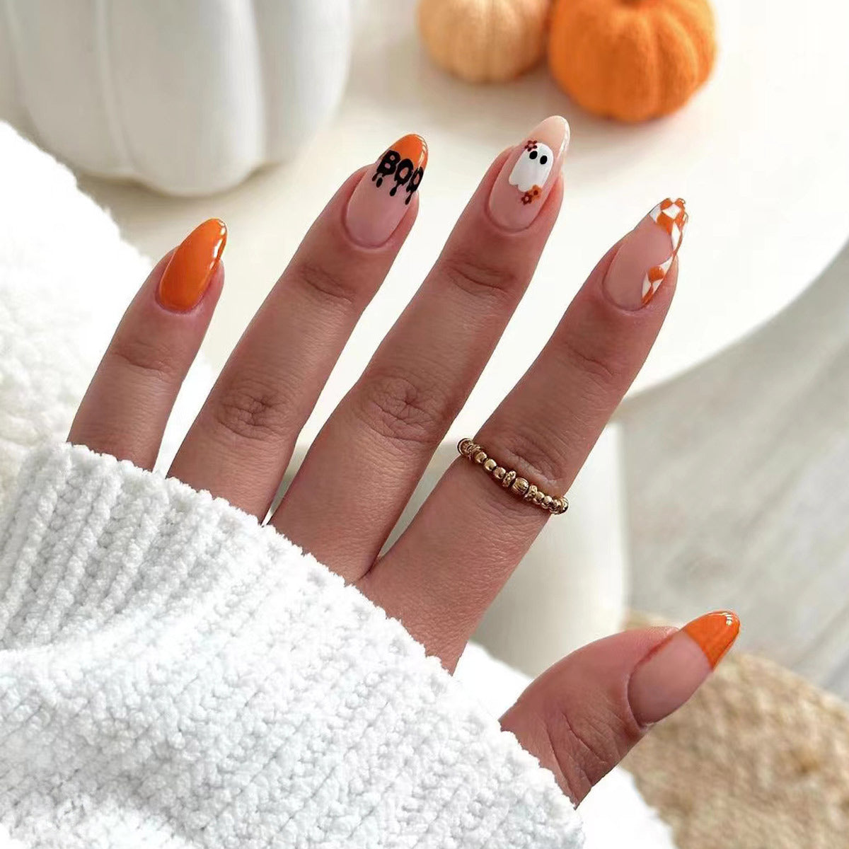 Spooktacular Short Almond Orange Glow Press On Nail Set with Unique Halloween Designs