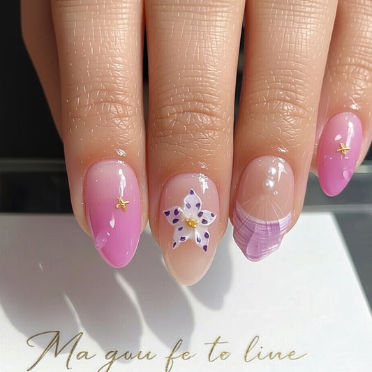 Dreamy Floral Charm Elegant Long Almond Pink Gradient Nails with Unique Decorative Accents