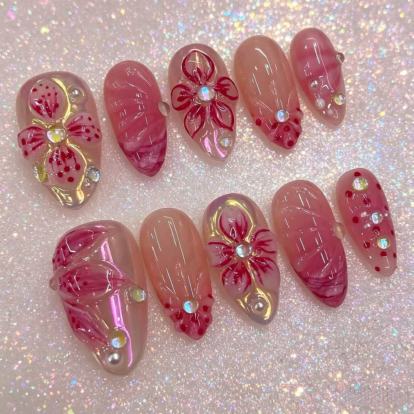 Blooming Romance Long Almond Blush Pink Gradient Press On Nail Set with Floral Embellishments and Sparkling Accents