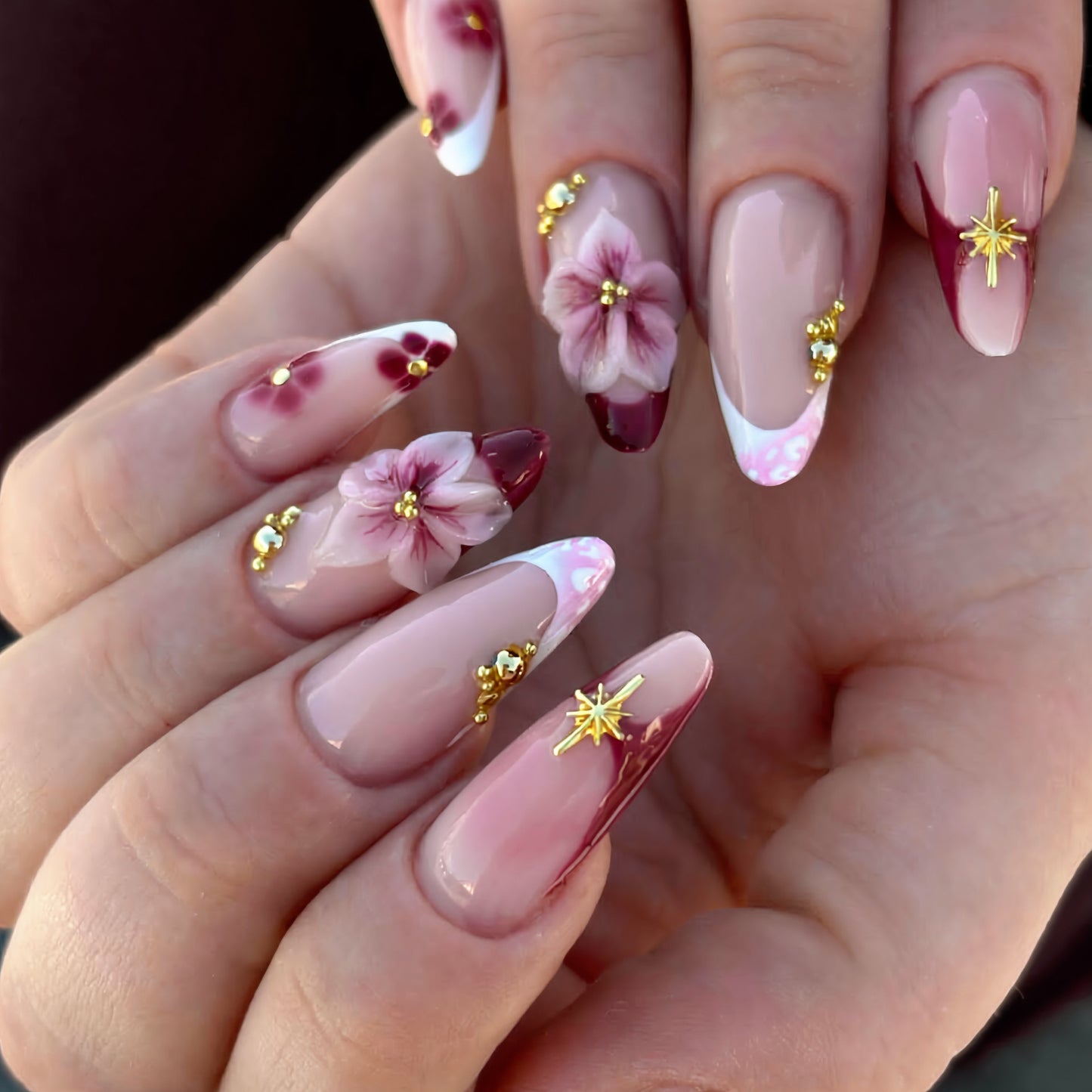 Floral Fantasy Long Almond Pink and Burgundy Press-On Nail Set with Vibrant Flower Accents and Shimmery Gold Details