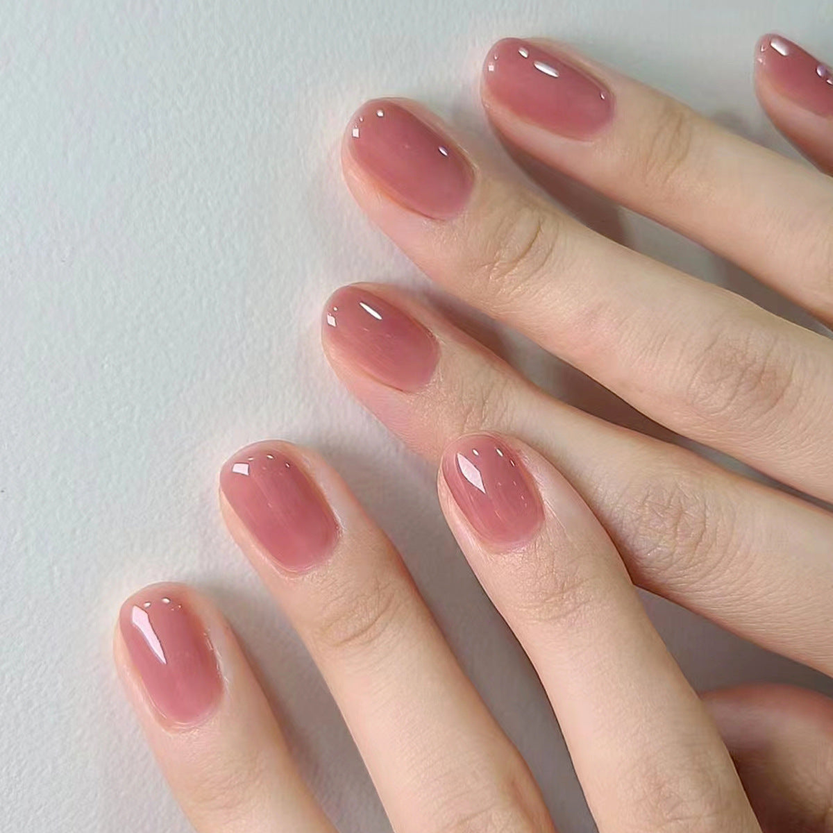 Elegant Blossom Medium Oval Pink Glossy Nail Set with Smooth Finish