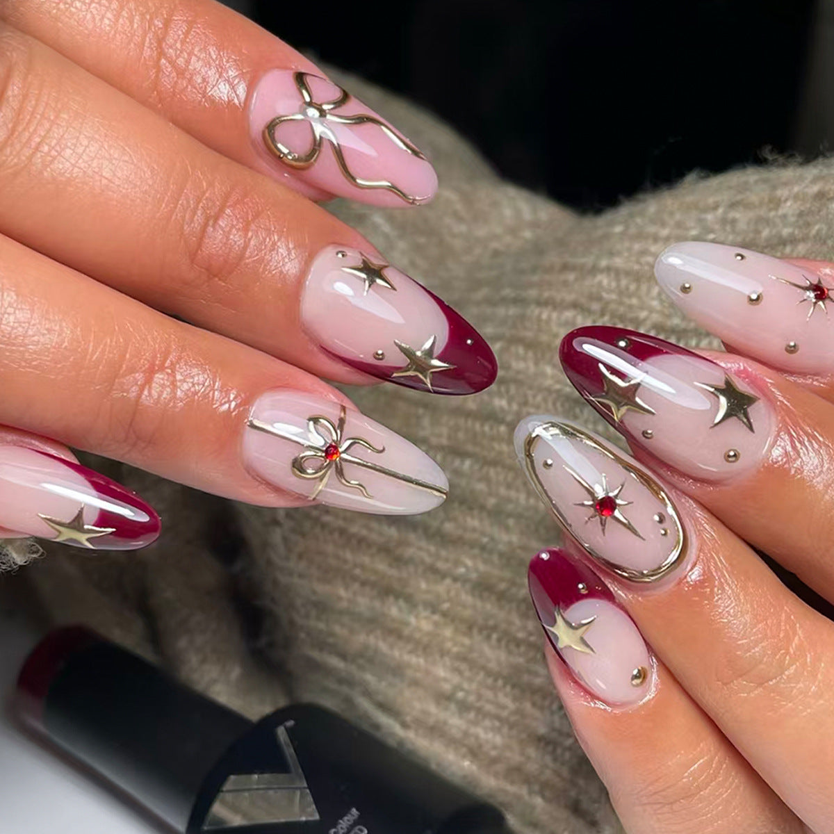 Celestial Glamour Medium Almond Burgundy and Clear Press on Nail Set with Metallic Star Accents
