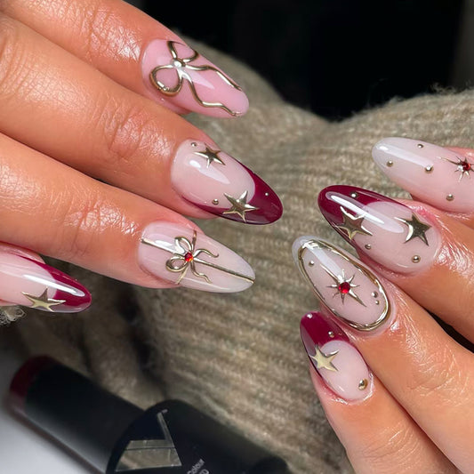 Celestial Glamour Medium Almond Burgundy and Clear Press on Nail Set with Metallic Star Accents