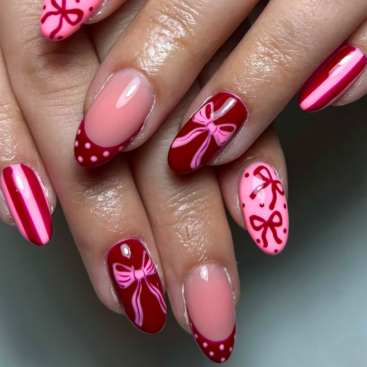 Charming Bow Inspired Medium Oval Red and Pink Press on Nail Set