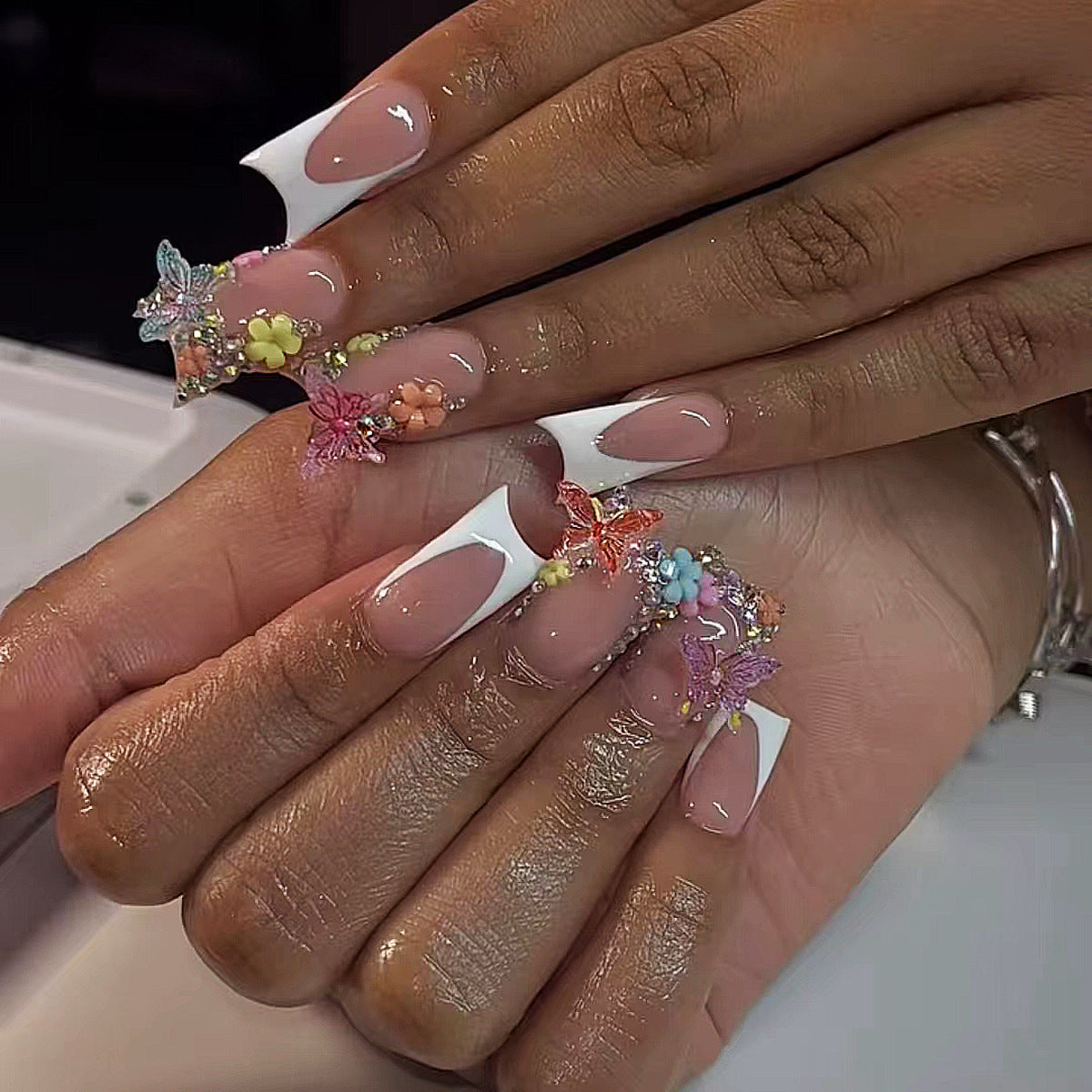 Whimsical Floral Long Square White Tips Nail Set with Stunning Butterfly Accents