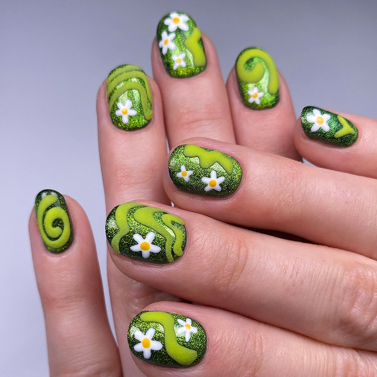 Whimsical Green Short Squoval Nail Set with Glittery Floral Accents