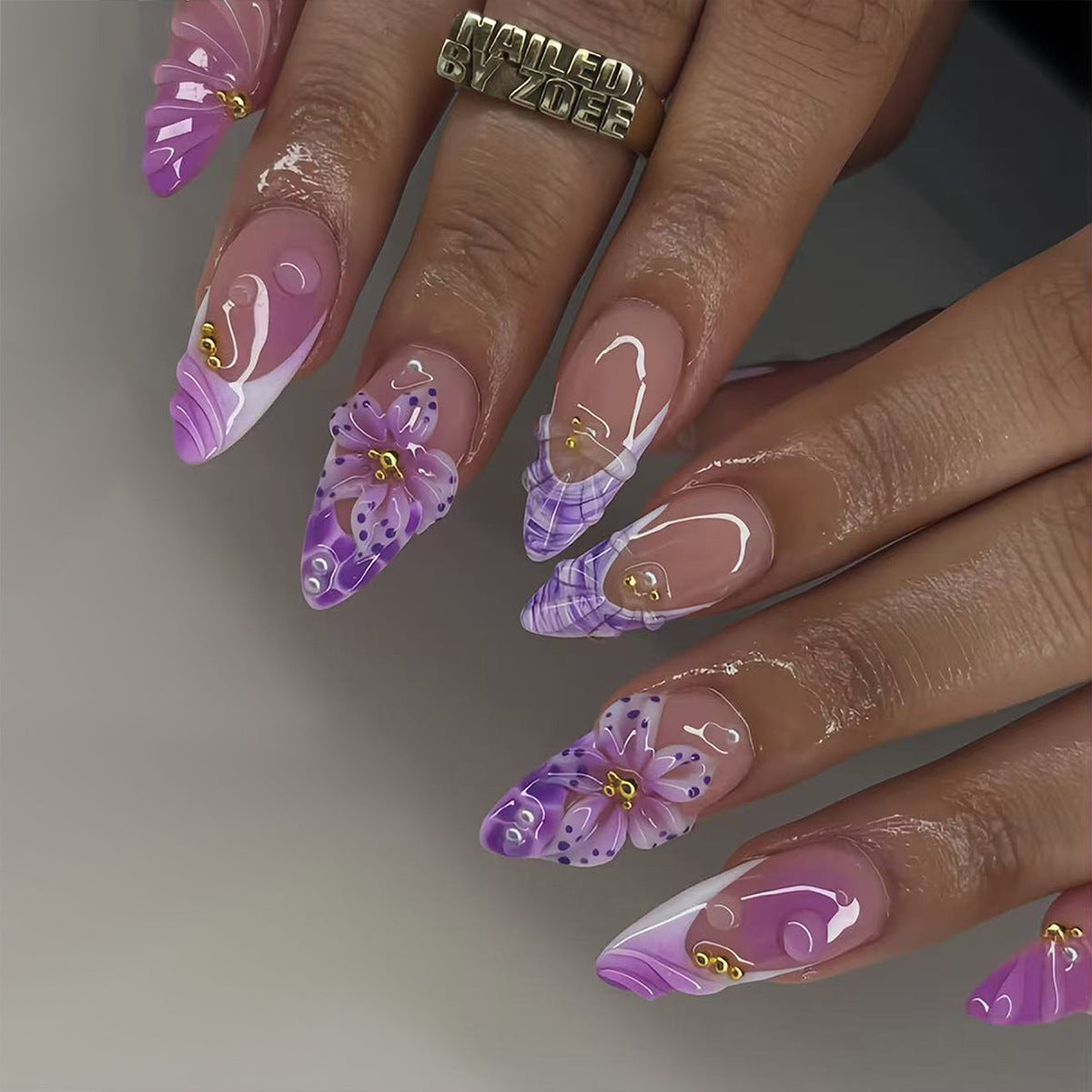 Floral Fantasy Medium Almond Purple Press On Nail Set with Unique Floral Artistry