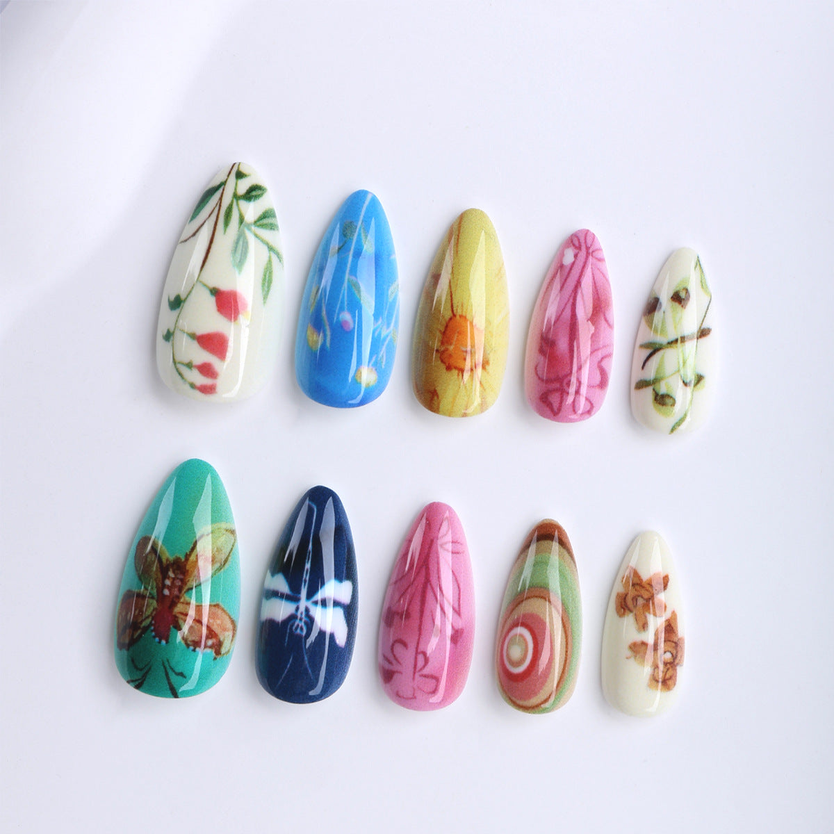 Floral Fantasy Medium Almond Multi-Colored Nail Set with Nature-Inspired Designs