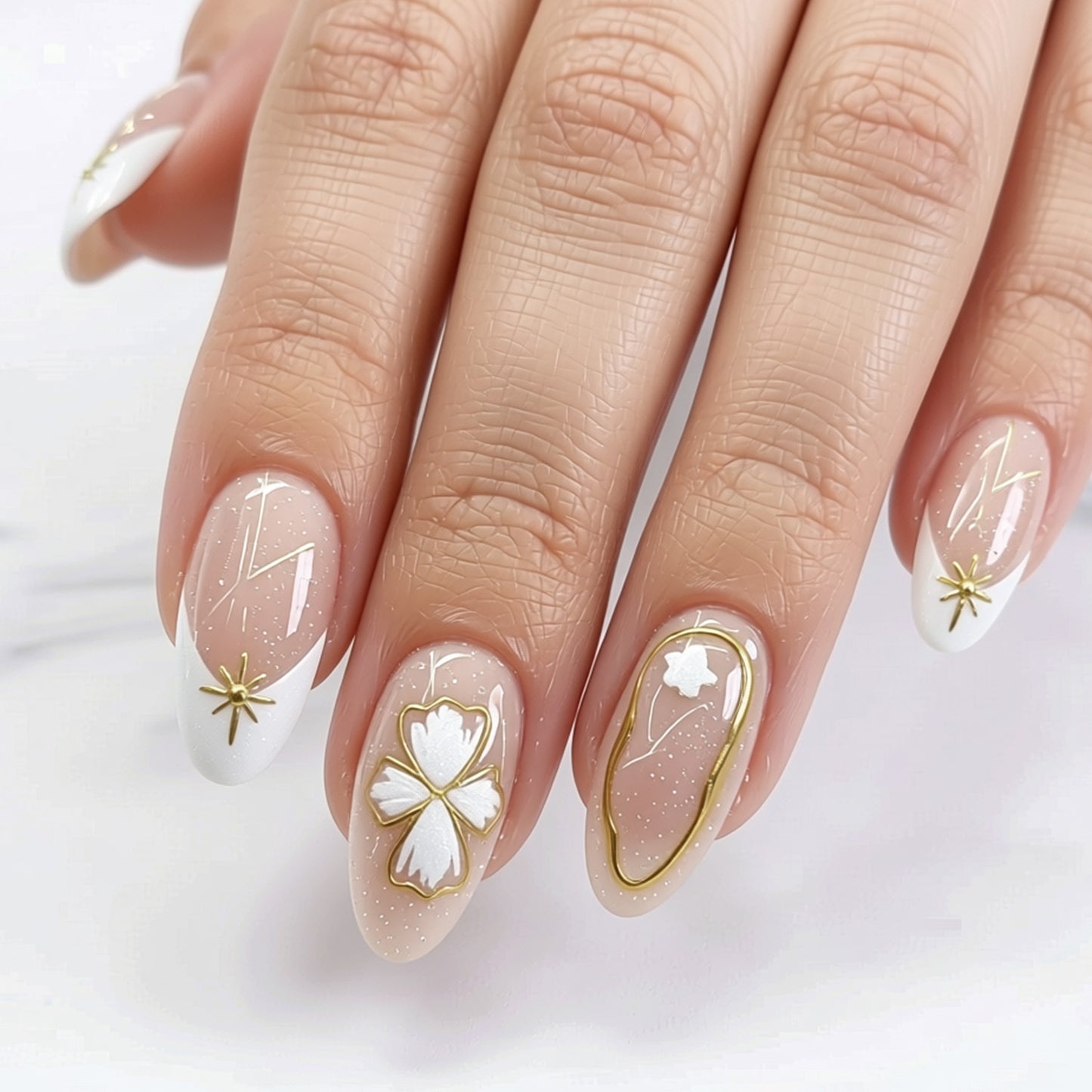 Celestial Chic Medium Almond Shaped Beige and White Nail Set with Gold Floral Accents