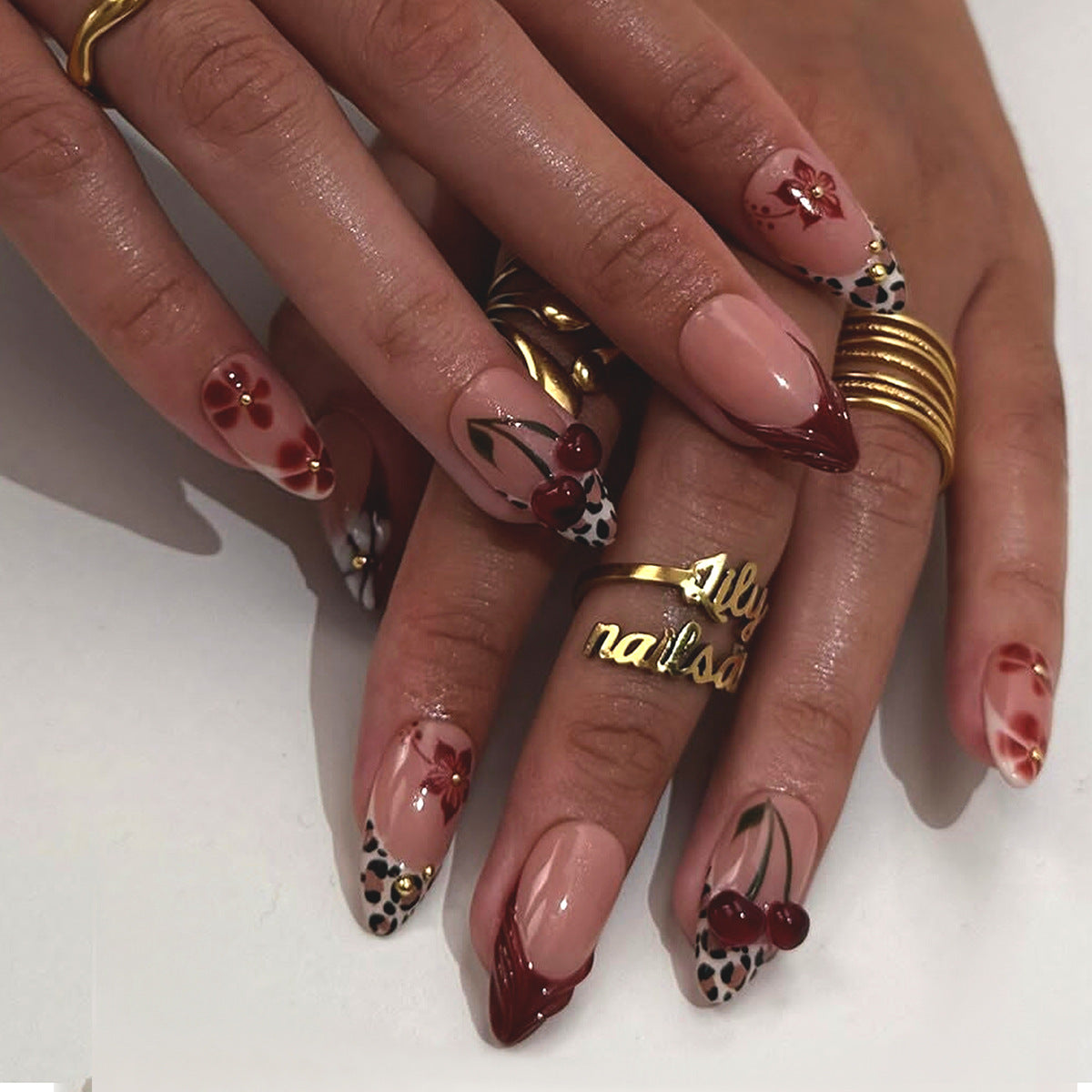 Chic Cherry Blossom Medium Almond Beige with Floral Accents Nail Set