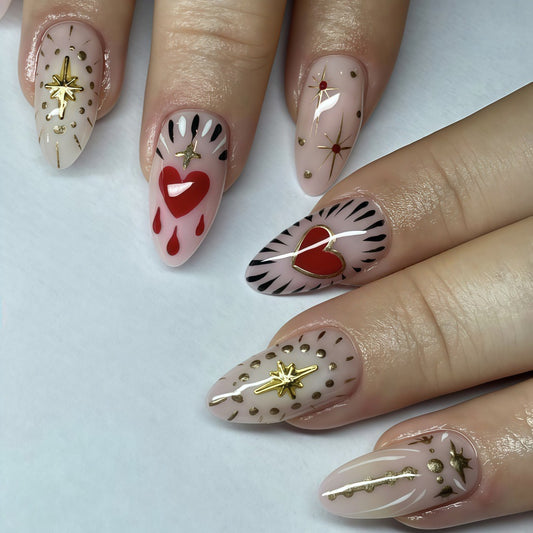 Cosmic Heart Elegance Short Almond Soft Pink with Starry Gold Accents and Heart Designs Press On Nail Set