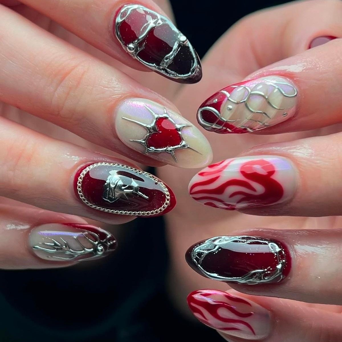 Gothic Romance Short Almond Red and Clear Nail Set with Intricate Metallic Accents