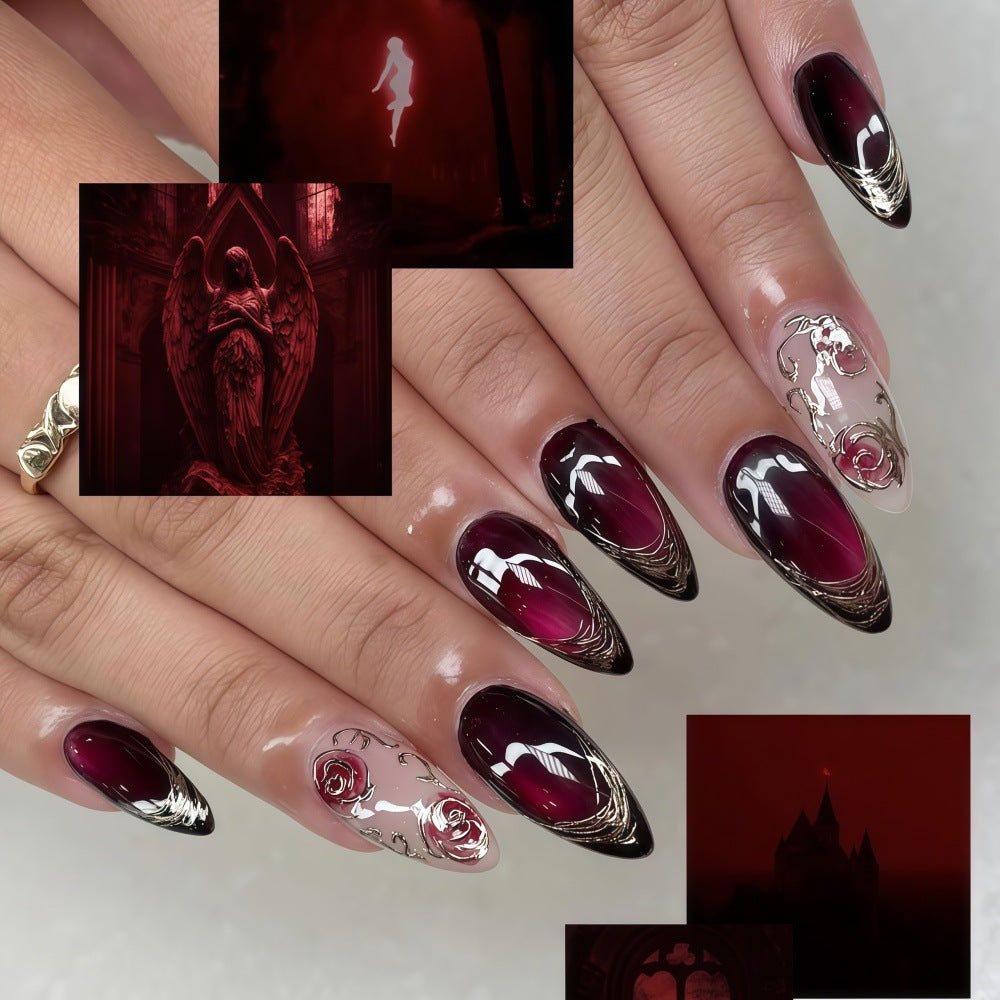 Mystical Elegance Long Stiletto Burgundy Gradient Nails with Intricate Floral Design
