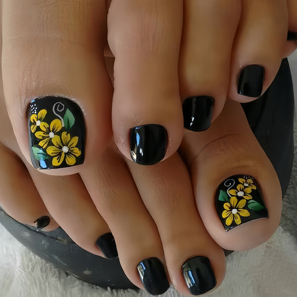 Charming Floral Escape Short Square Black Press On Toenail Set with Vibrant Yellow Flower Accents