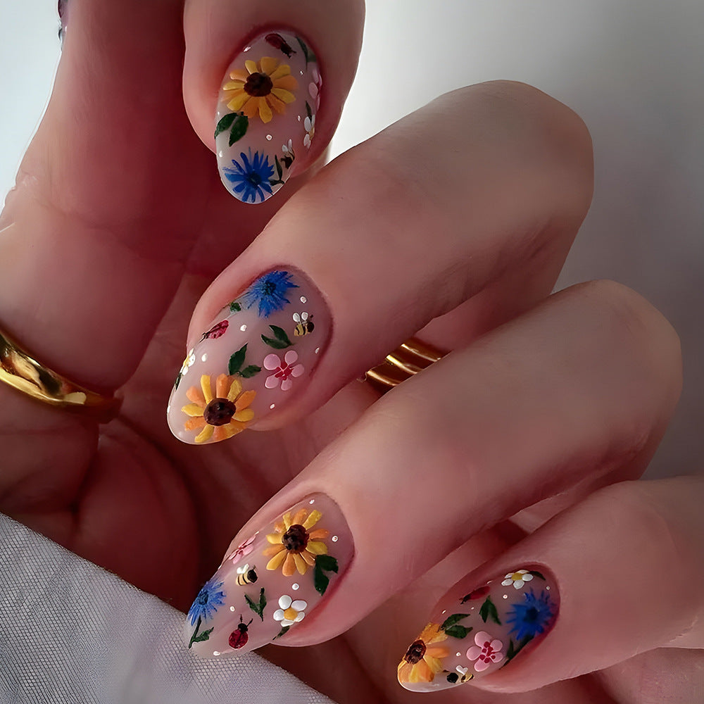 Blooming Garden Floral Medium Almond Press On Nail Set in Beige with Colorful Hand-Painted Flowers and Glitter Accents