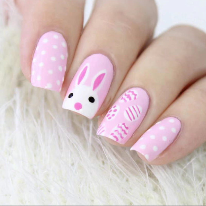 Nails with bunny design on a white background