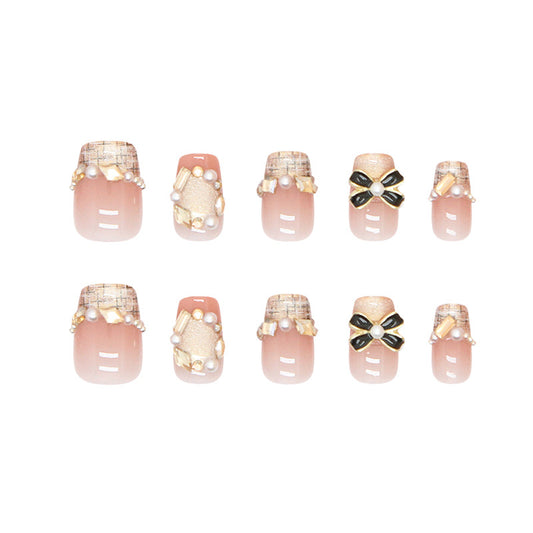 Chic Elegance Short Square Pink Nails with Jewel Accents and Ribbon Designs