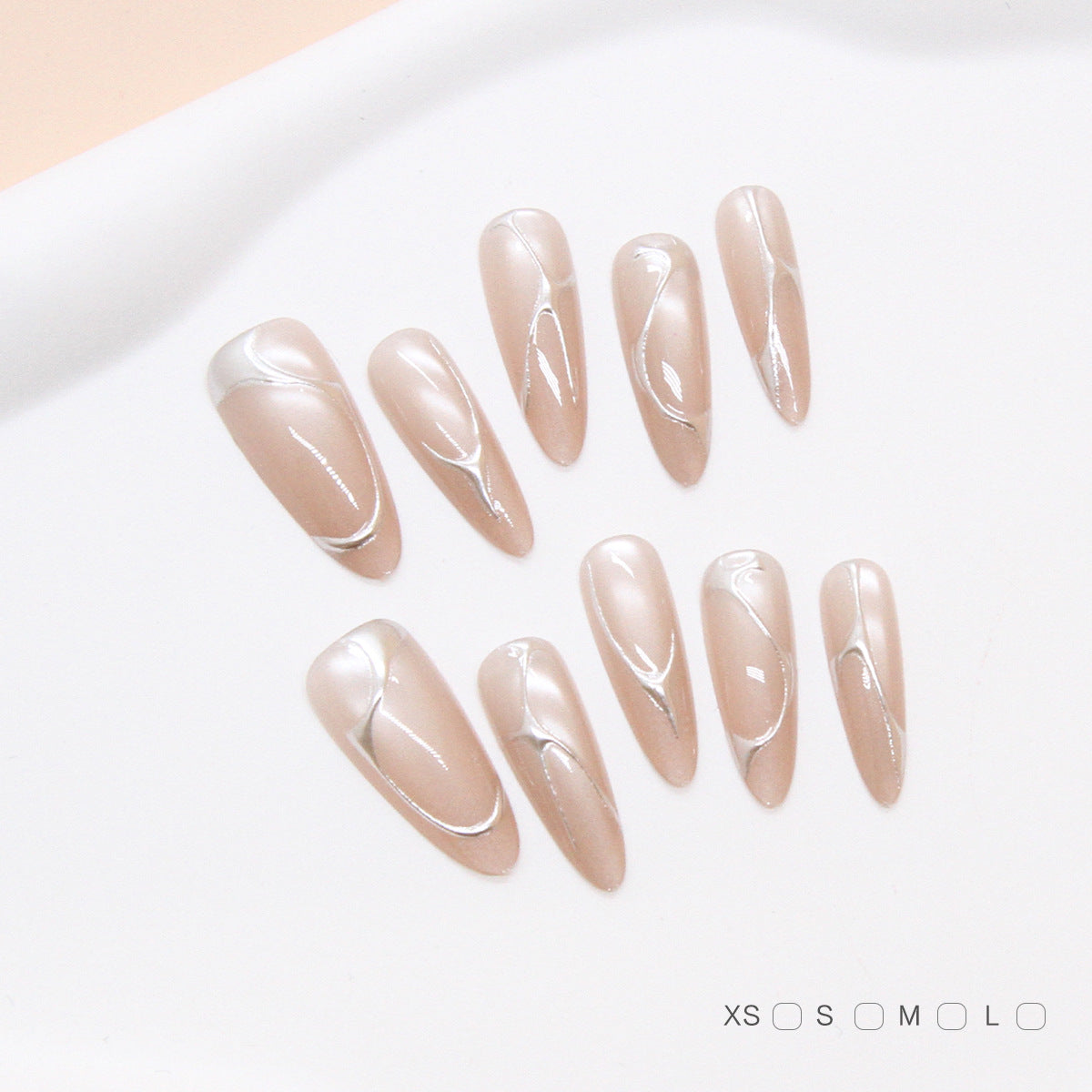 Chic Elegance Long Almond Shaped Soft Beige Nails with Unique Artistic Swirl Accent