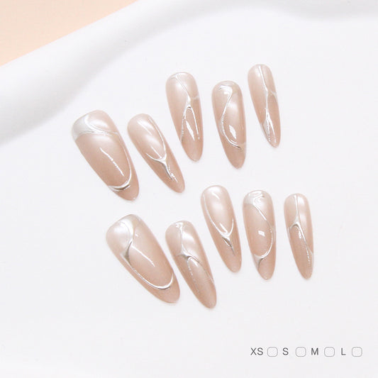 Chic Elegance Long Almond Shaped Soft Beige Nails with Unique Artistic Swirl Accent