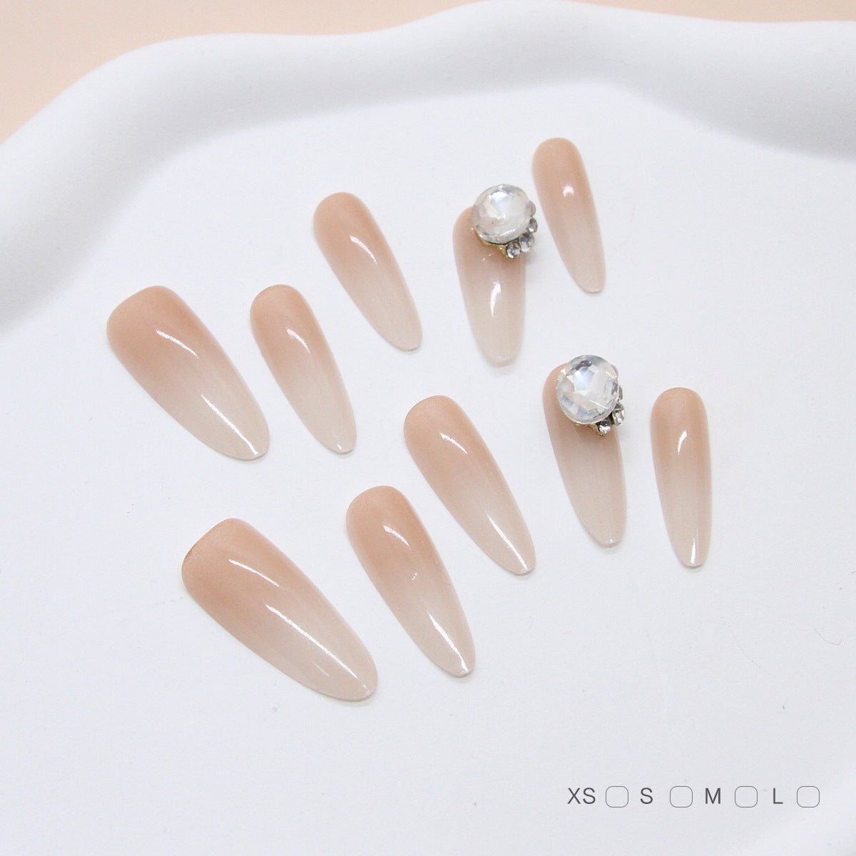 Elegant Whispers Long Almond Shaped Beige Press-On Nails with Sparkling Jewel Accent