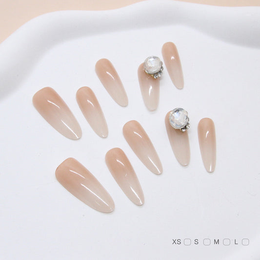 Elegant Whispers Long Almond Shaped Beige Press-On Nails with Sparkling Jewel Accent