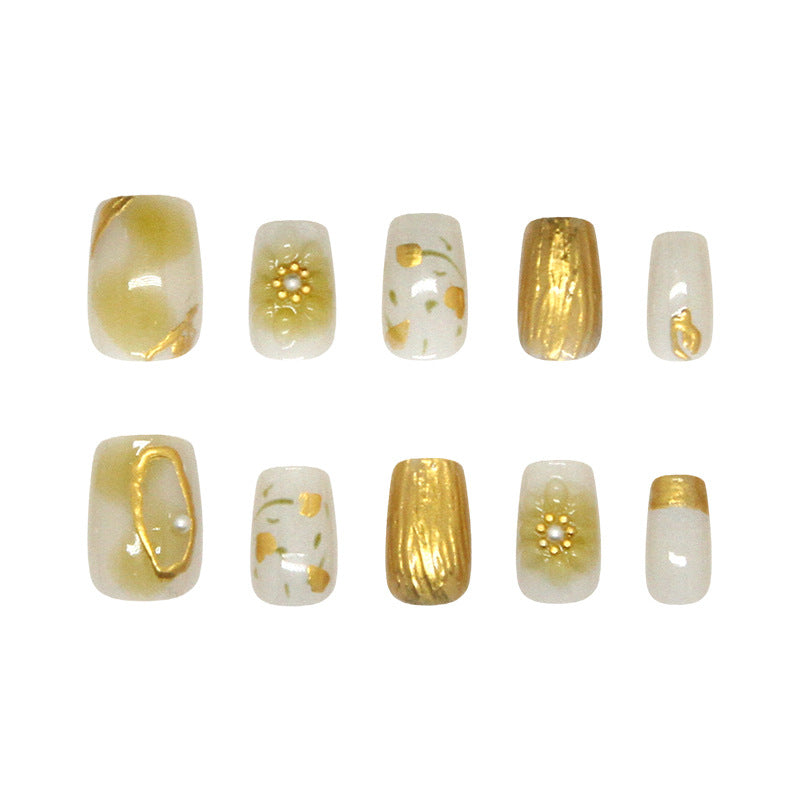 Glamorous Elegance Short Square Cream and Gold Nail Set with Floral Accents and Pearl Details