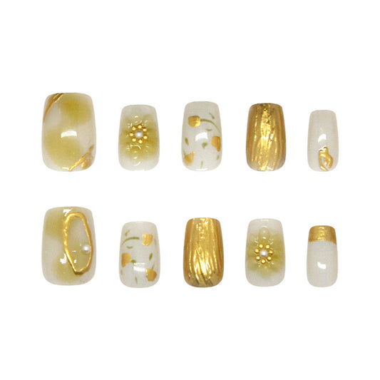 Glamorous Elegance Short Square Cream and Gold Nail Set with Floral Accents and Pearl Details