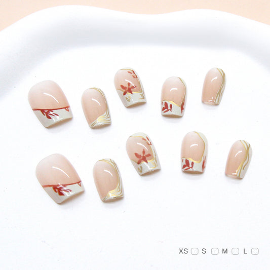 Set of nail art designs on a white tray with size indicators at the bottom.