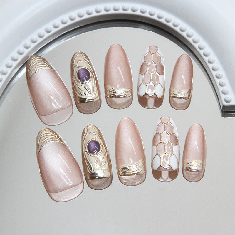 Elegant Garden Blush Short Almond Shaped Pink Press On Nails with Metallic Gold Accents and Unique Honeycomb Design