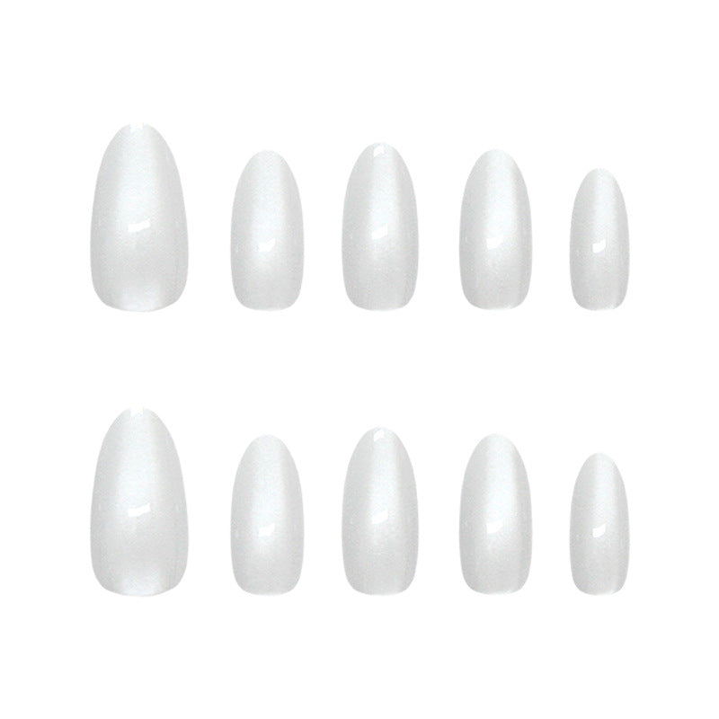 Set of white nail extensions on a white background