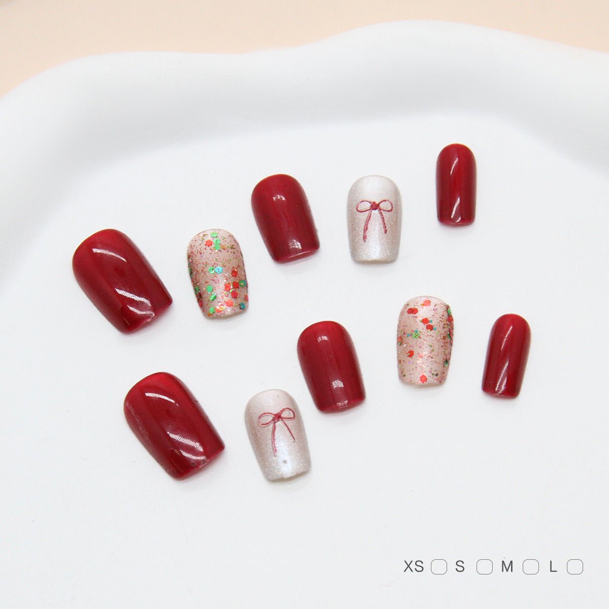 Festive Charm Glossy Short Length Coffin Red Nail Set with Glitter and Ribbon Accents