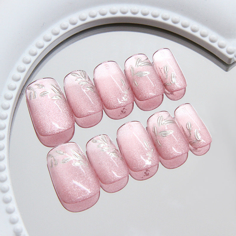 Set of pink nail art designs on a white background