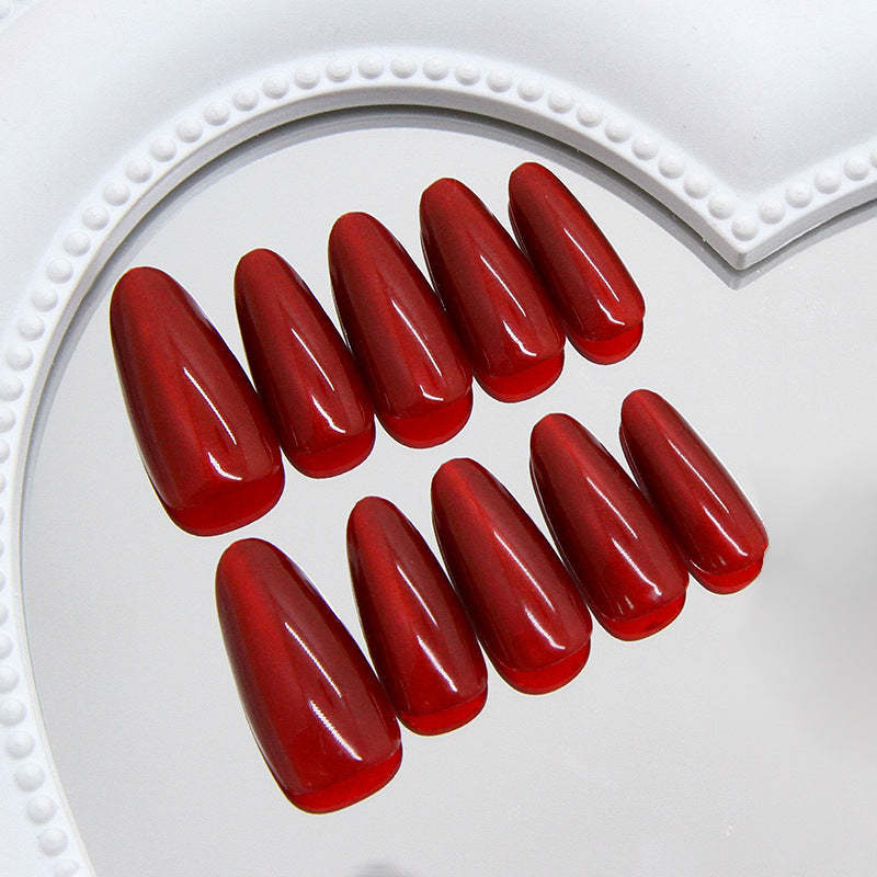 Elegant Scarlet Medium Almond Press On Nails with Glossy Finish and Unique Shape Design