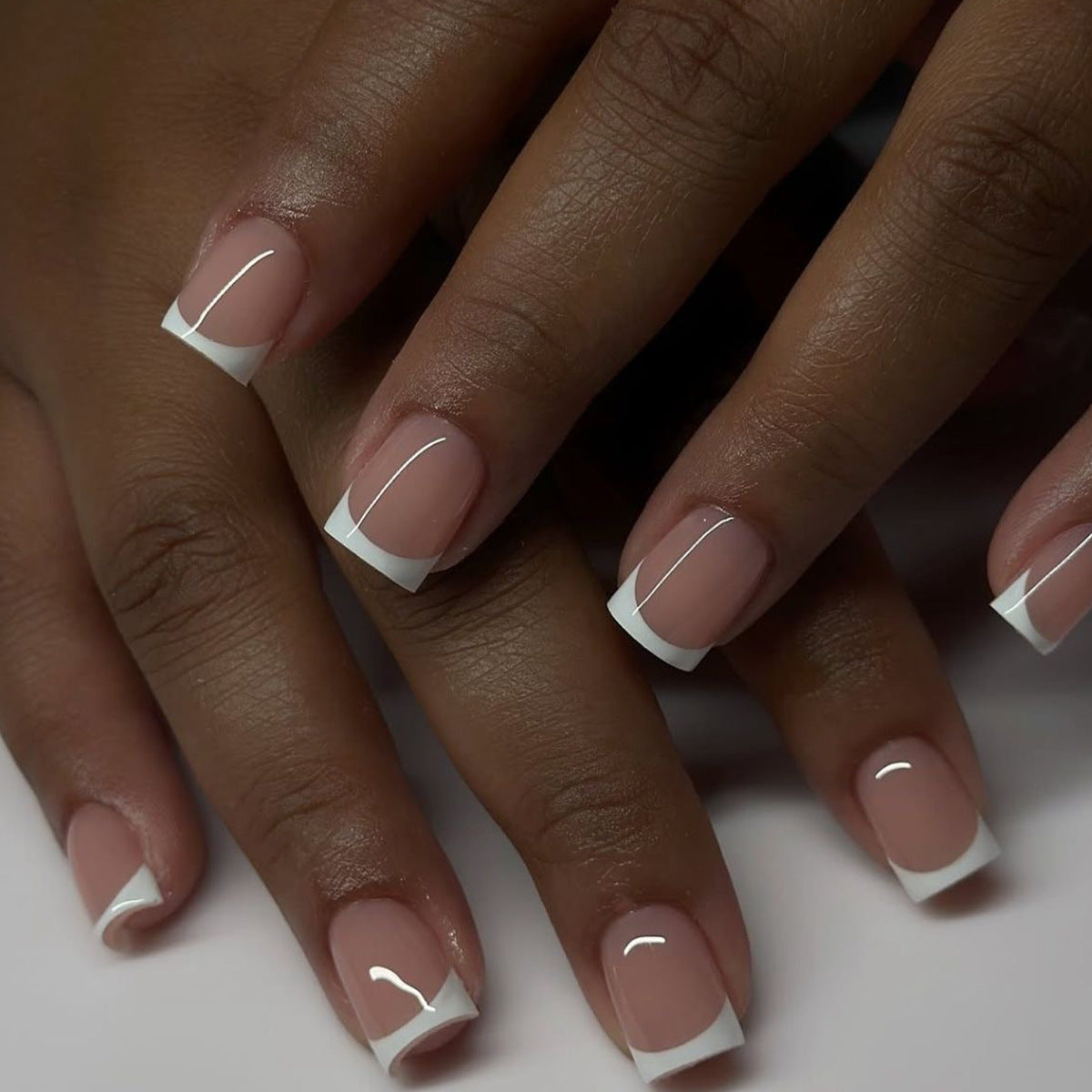 Elegant Chic Short Square Press On Nail Set in Medium Length Natural Beige with Glossy White Tips and Unique Minimalist Design