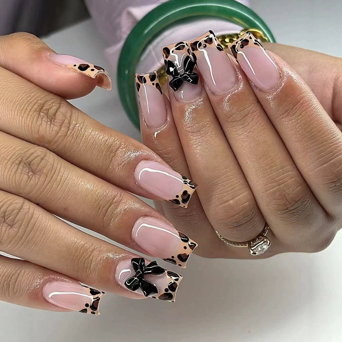 Savvy Animal Print Long Square Beige Press-On Nail Set with Unique Bow Detail