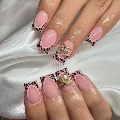 Elegant Safari Inspired Medium Square Pink Press On Nail Set with Unique Leopard Print Tips and Bow Accent